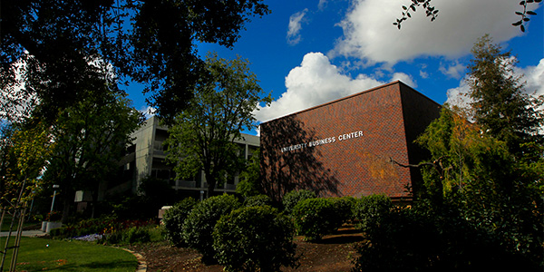 Ground view of the outside of the University Business Center in the Craig School of Business